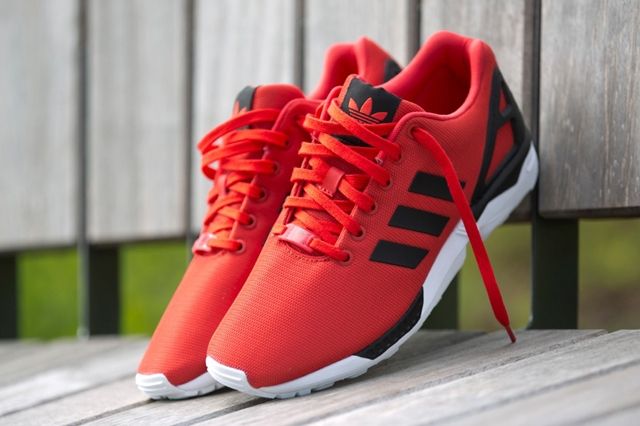 all red adidas zx flux