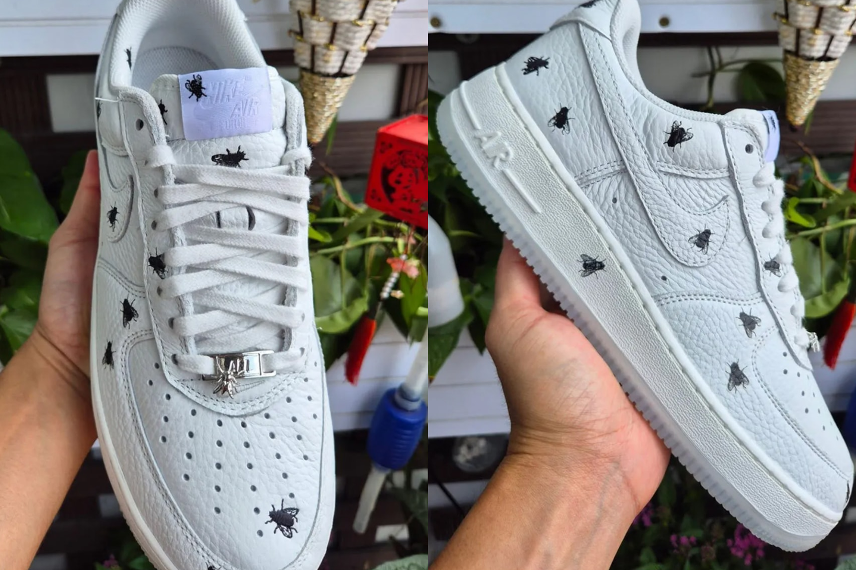 nike sneaker in hand shot printed with flies