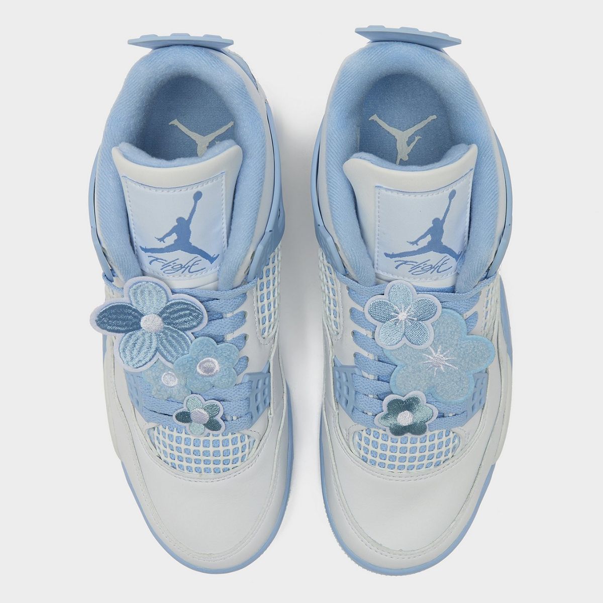 Flower Lace Charms on the Air Jordan 4 