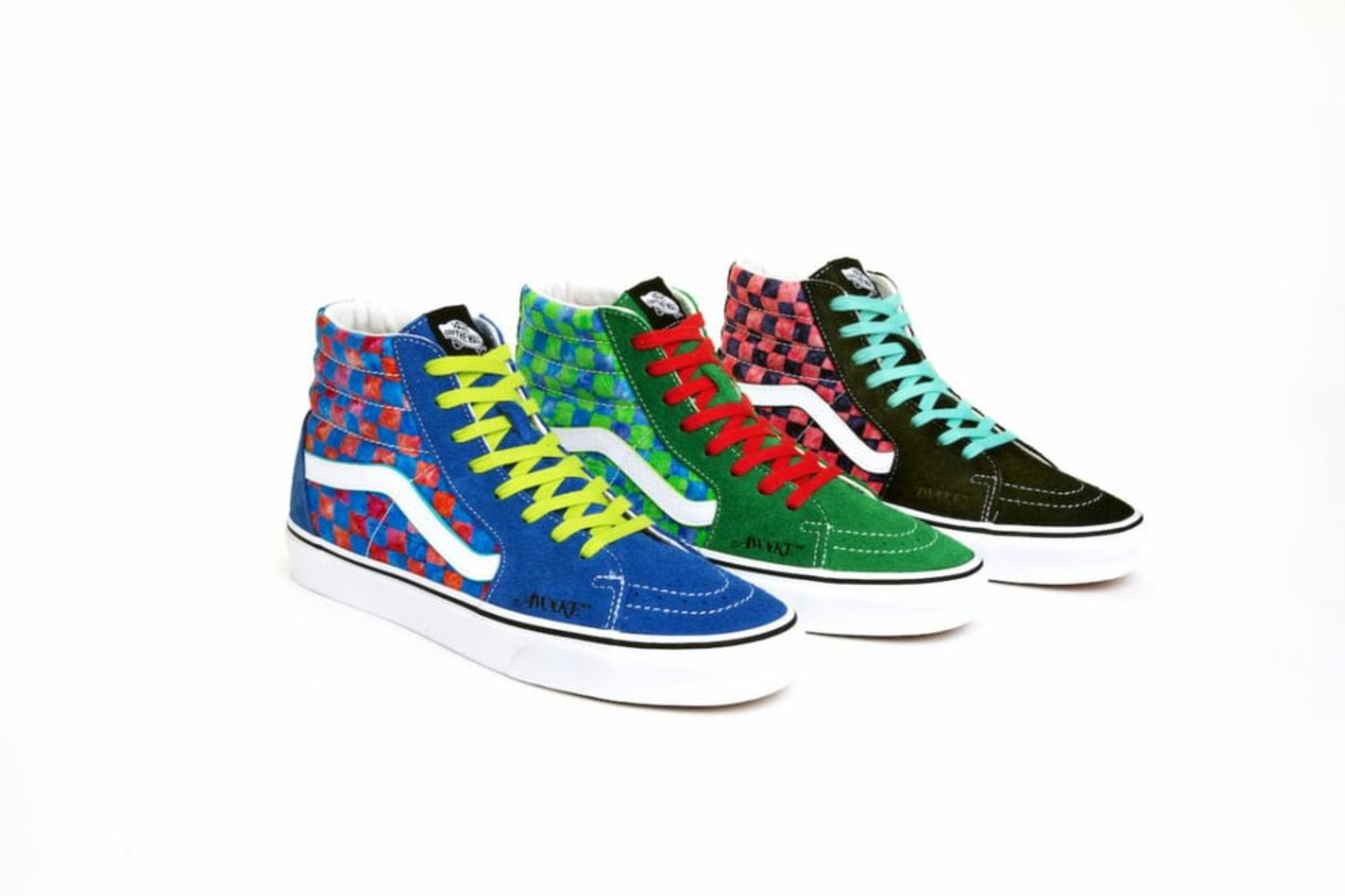 trio of vans sk8 hi sneakers on white background