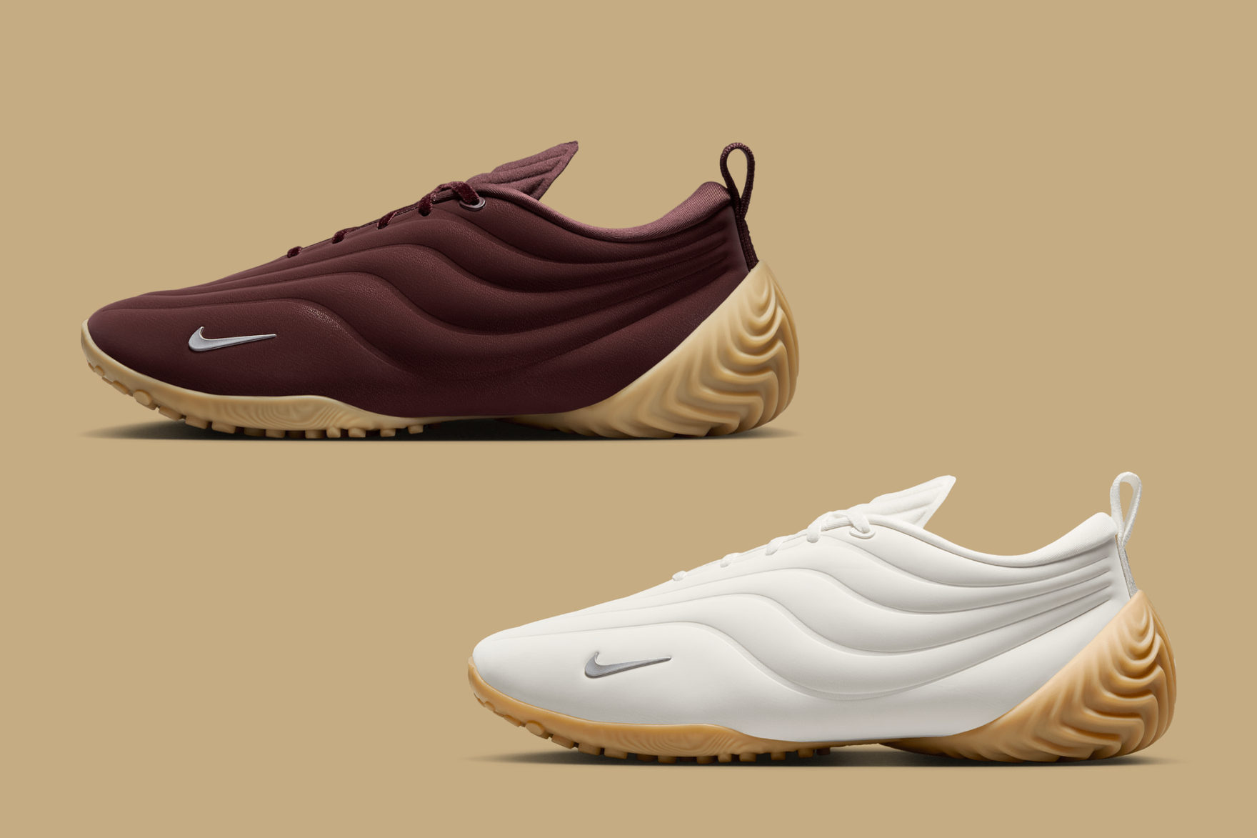 two pairs of nike astra ultras on a brown background