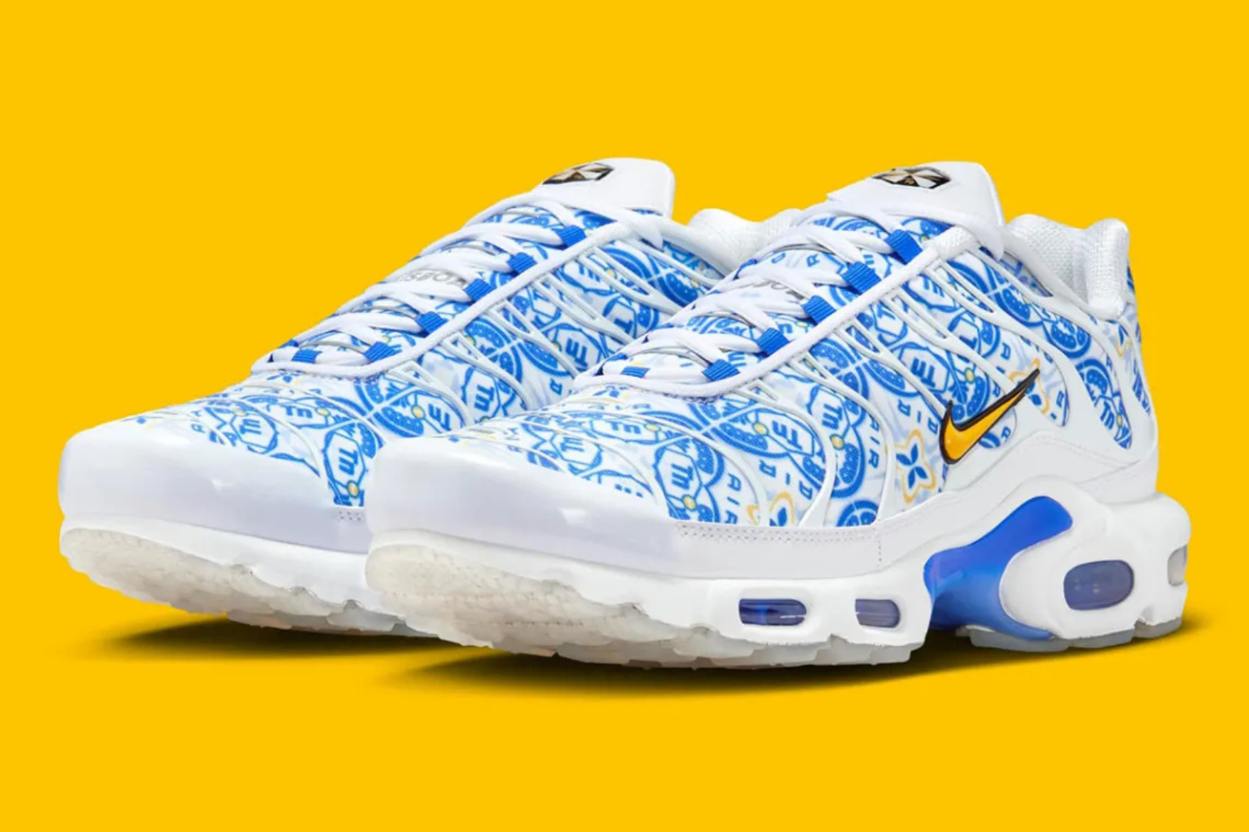 Nike Air Max Plus 'Lisboa' sneakers on yellow background