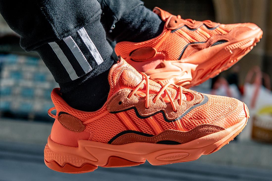 adidas ozweego orange on feet