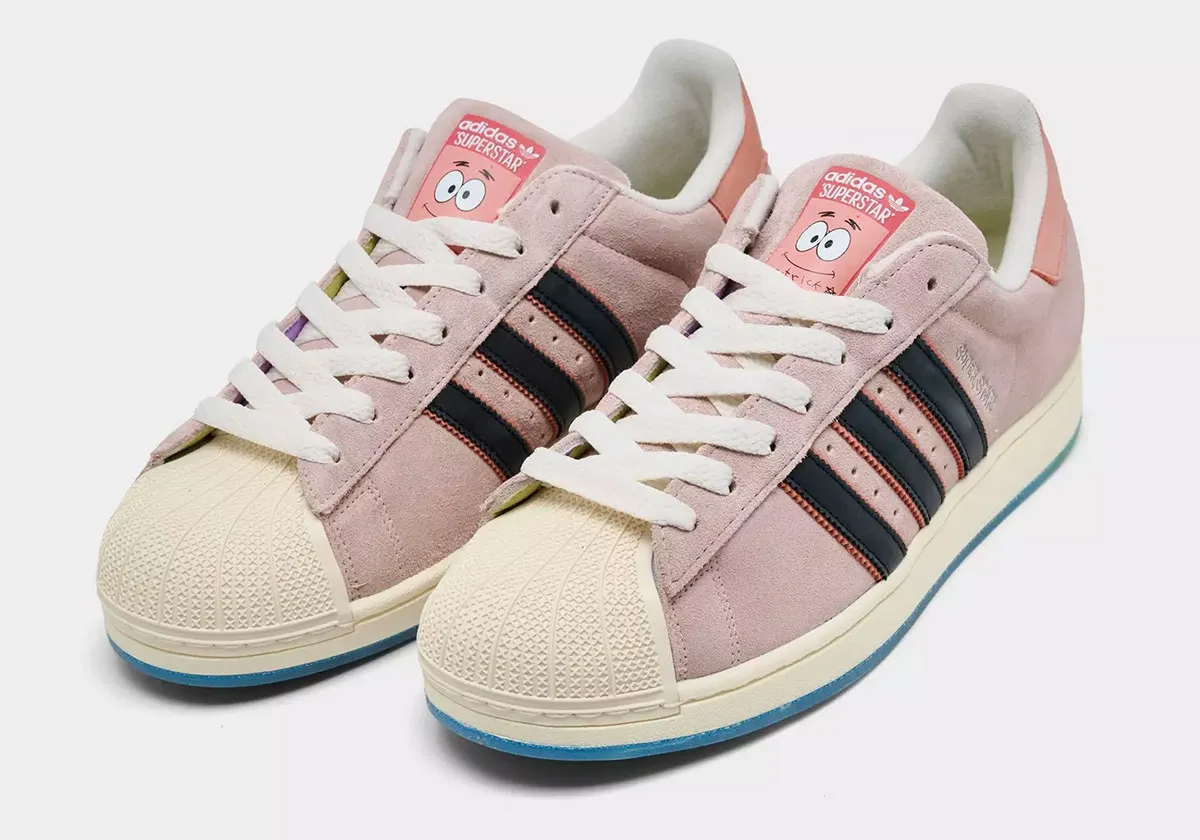 pink adidas superstars with patrick star face on tongue