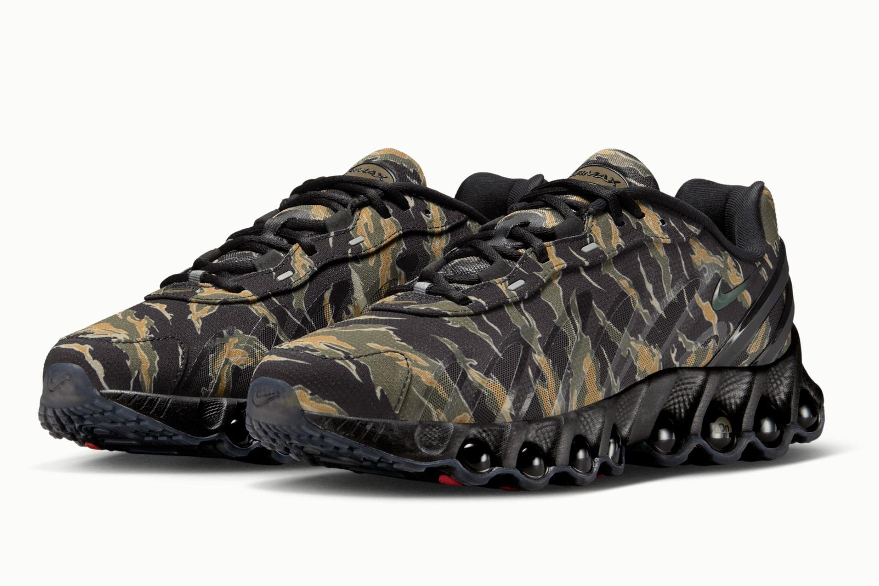Camo-print tiger Nike sneakers on white background