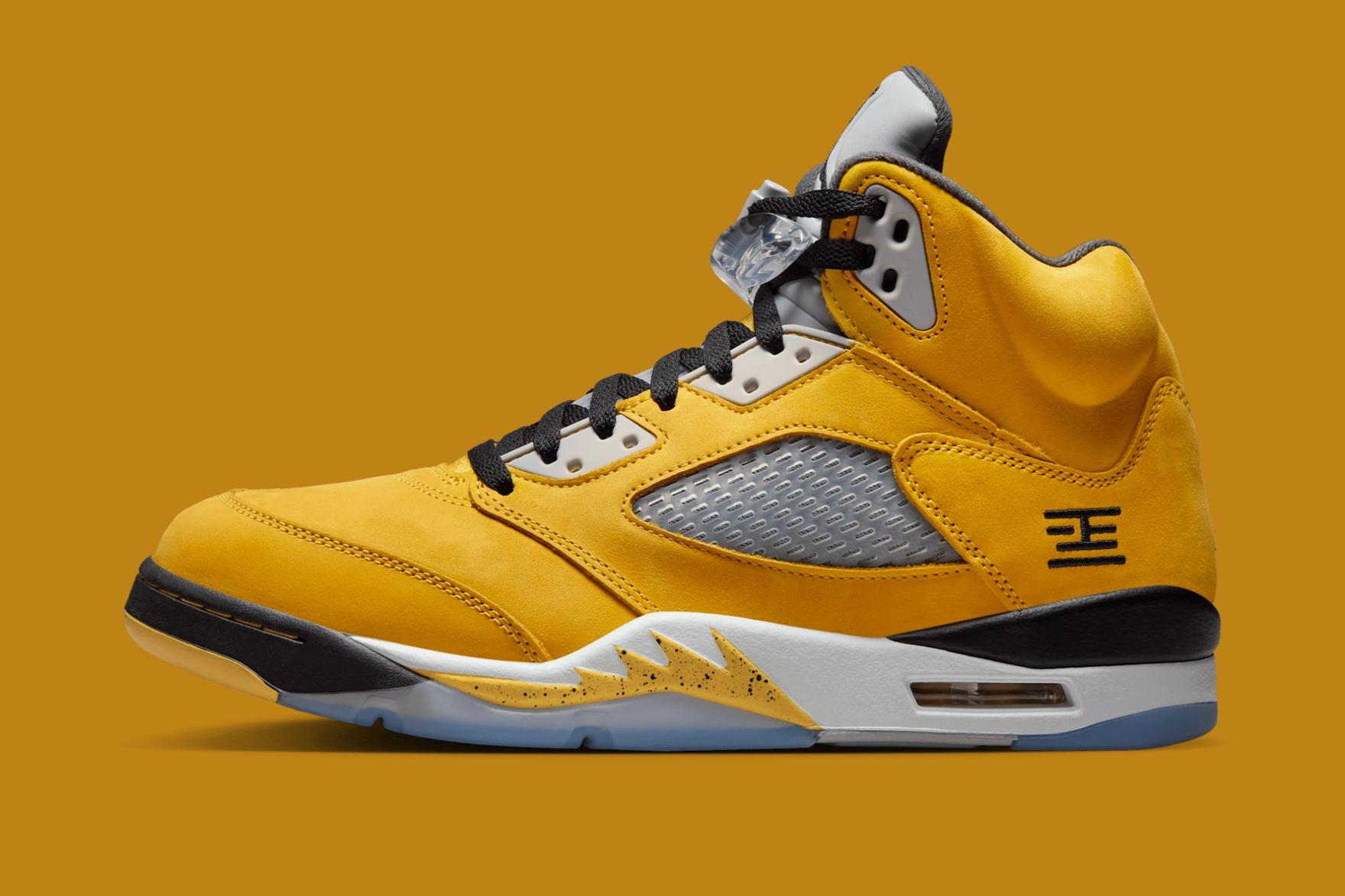 AJ5 Tokyo yellow sneakers on white background