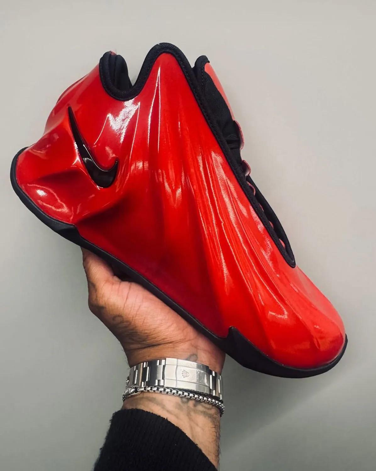 nike gt future black red in-hand white background silver watch