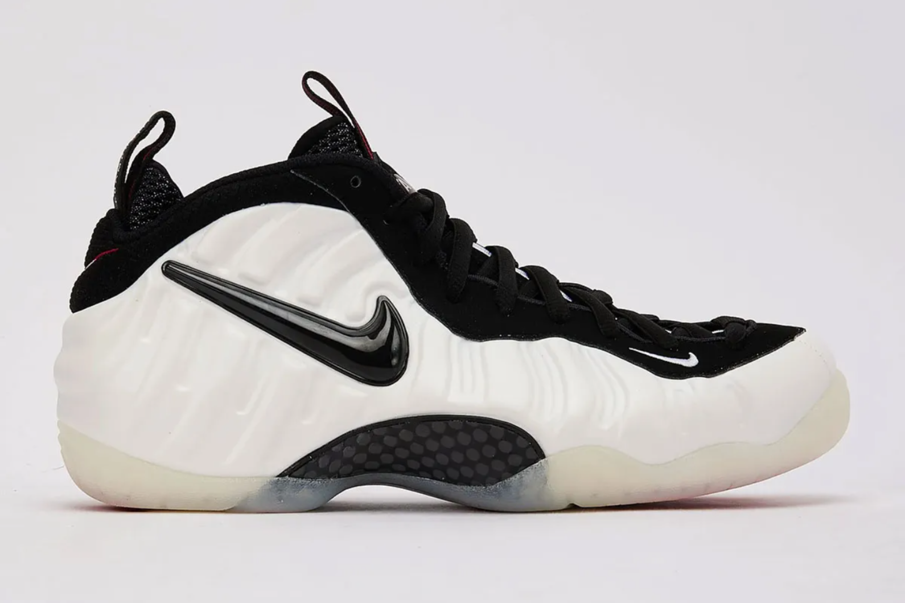 nike foamposite pro pearl ecom image on grey background