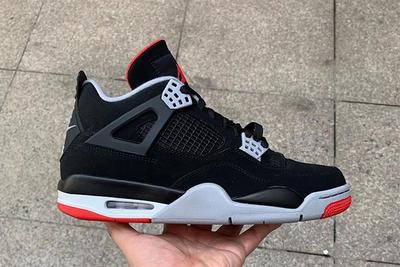 Air Jordan 4 Bred In Hand Up Close Right Side1