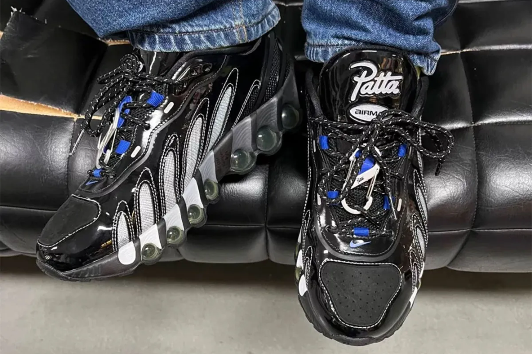 a close up shot of a patta x nike dn8 sneaker on-foot