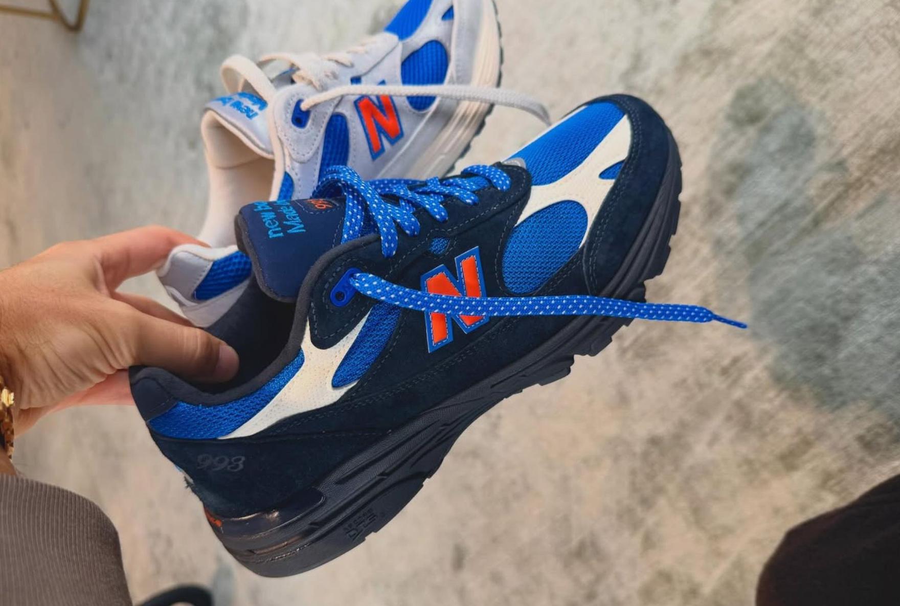 Ronnie FIeg holding Up Knicks pack Collaboration With New Balance