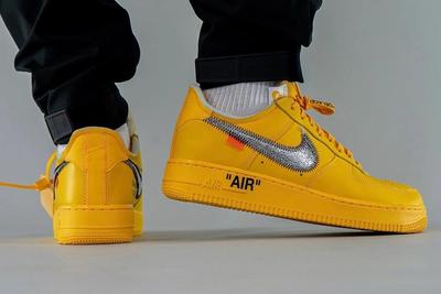 off white air force 1 university gold on foot