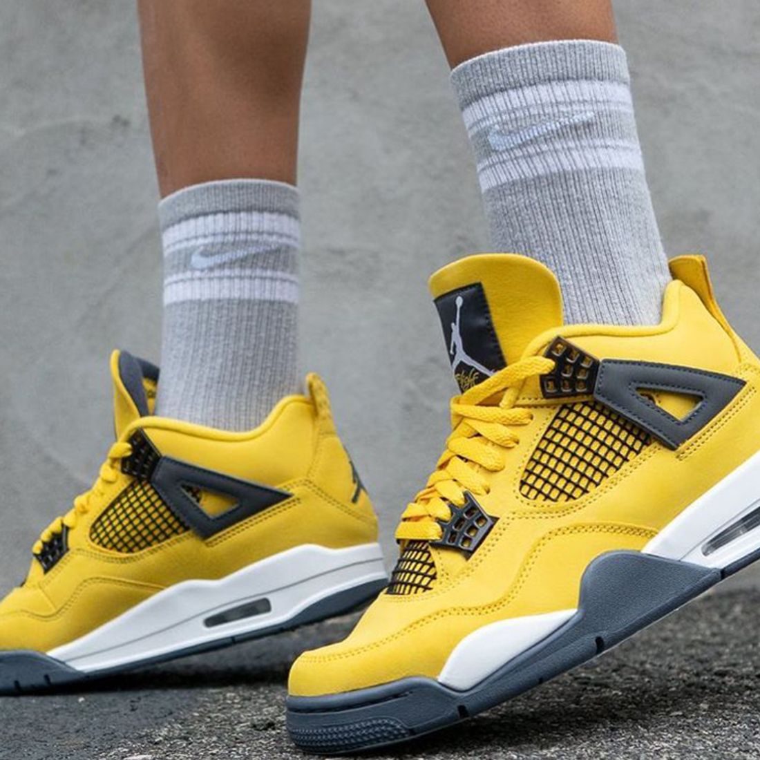 Here's How People are Styling Air Jordan 4 'Lightning' - Sneaker Freaker