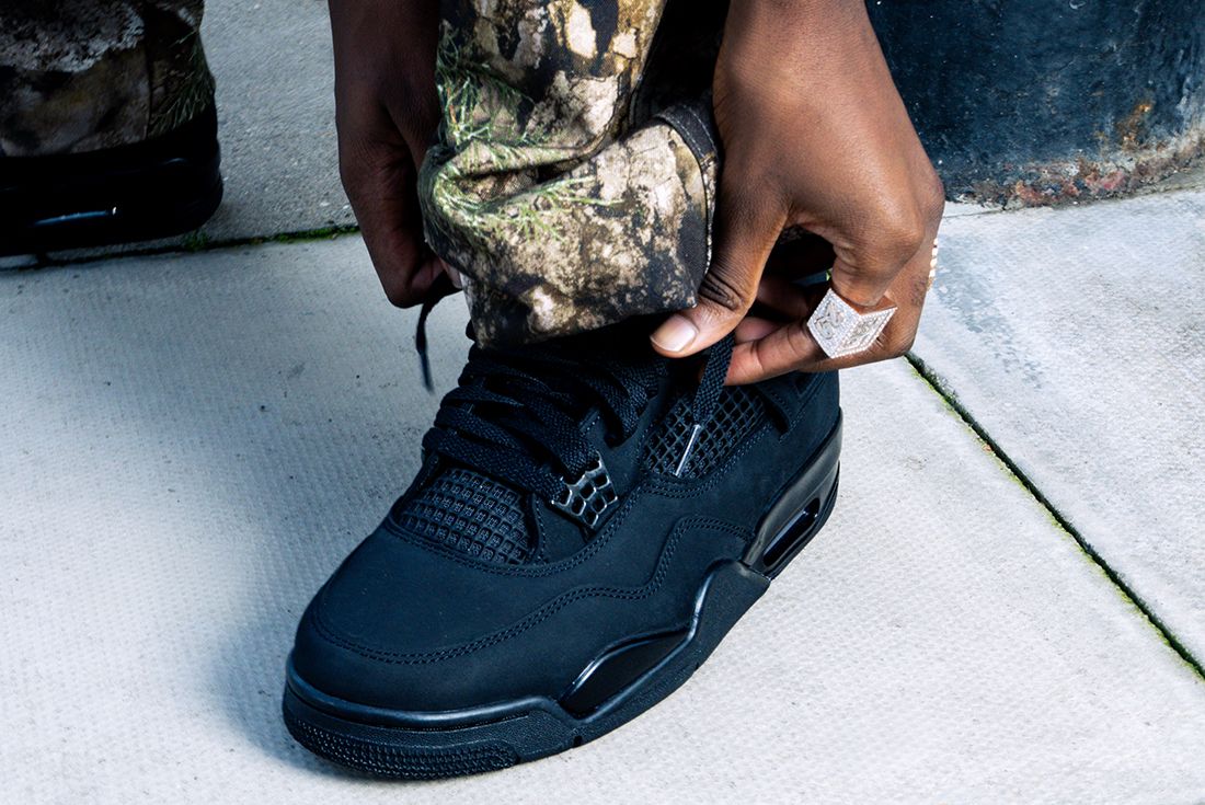 jordan 4 black cats on feet