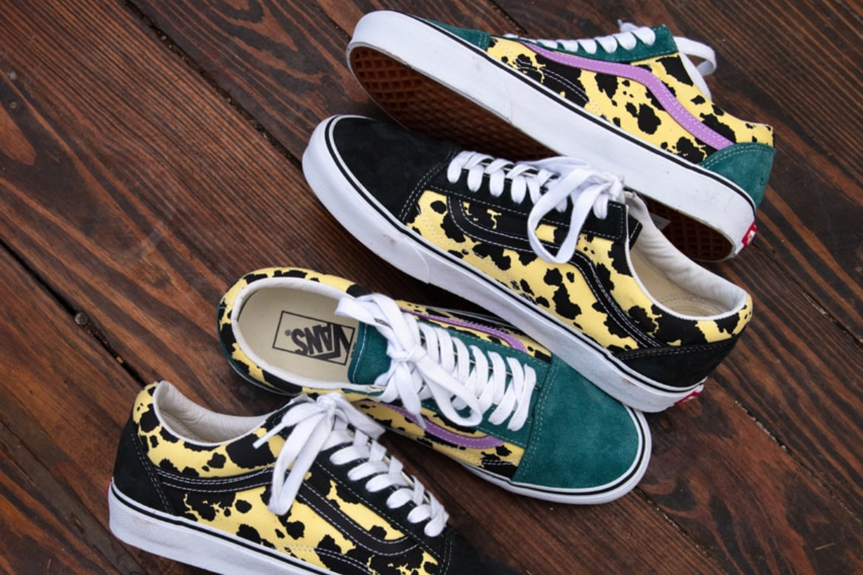awake ny x vans old skool on brown wooden flooring