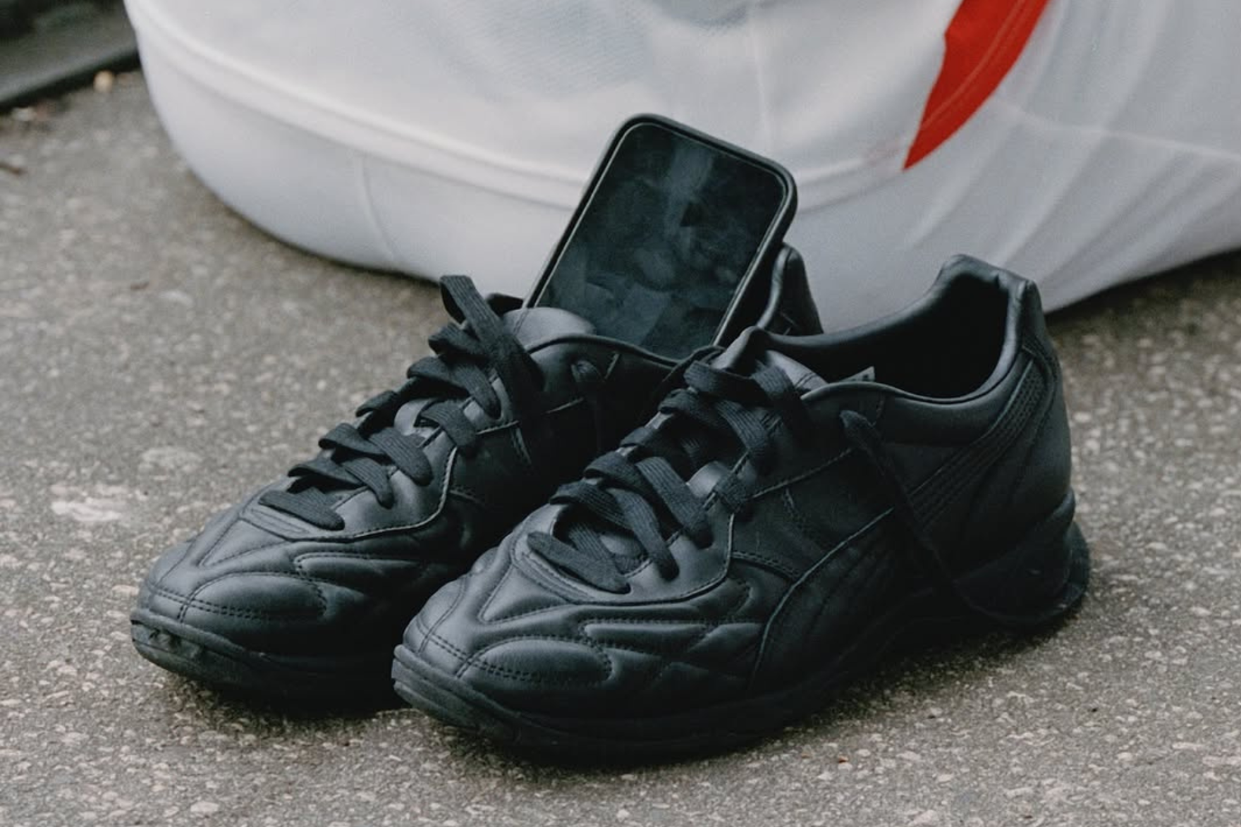 puma king indoor black close up shot