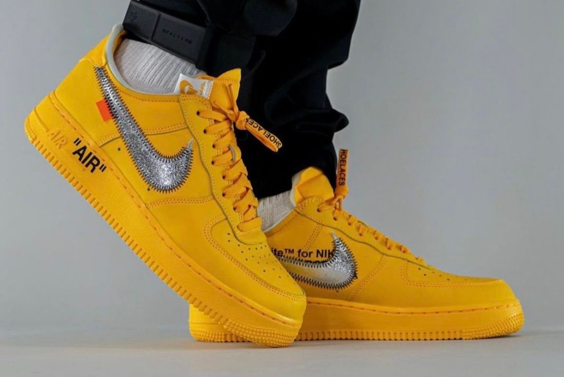 off white air force 1 university gold on foot
