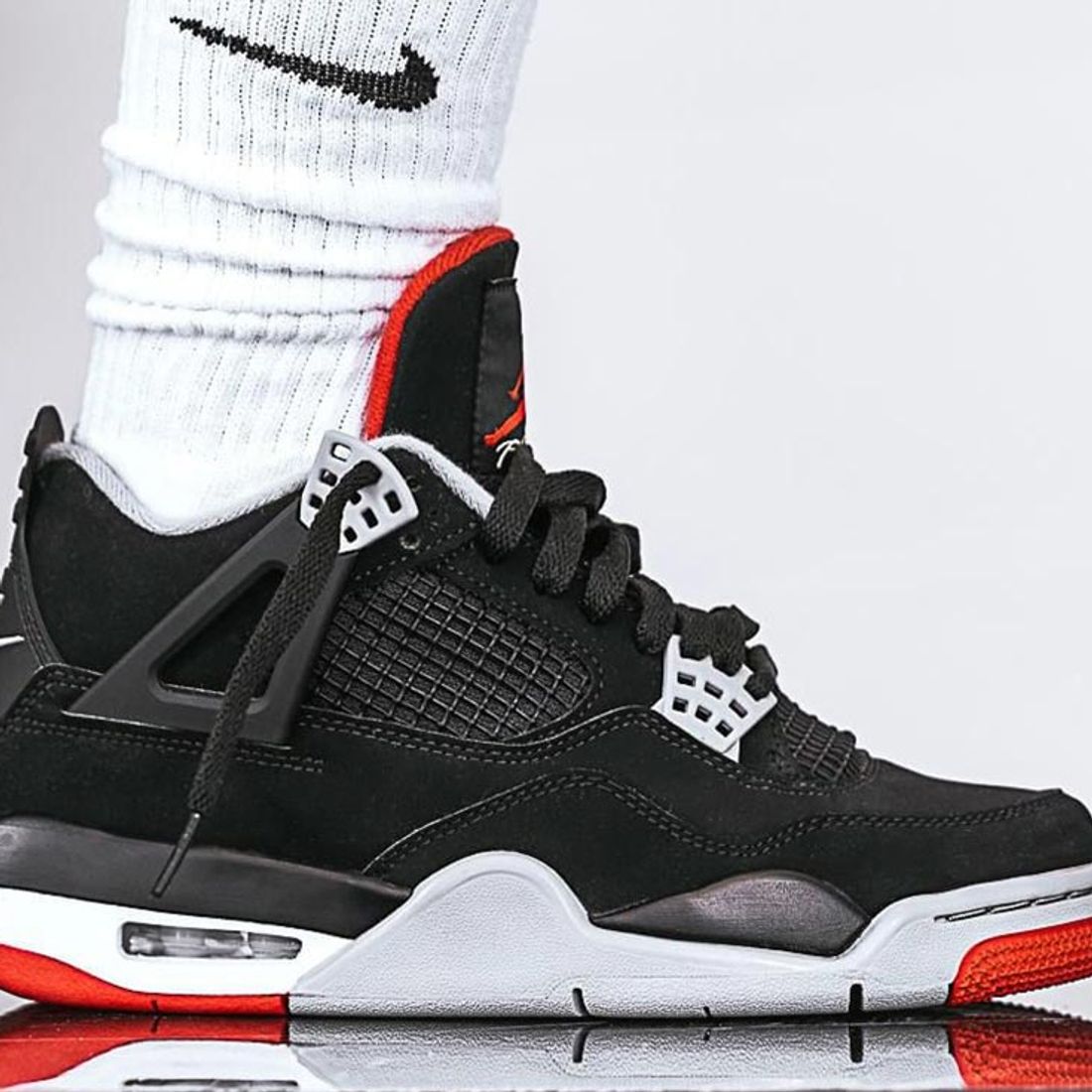 Here's People are Styling the Air Jordan 4 'Bred'