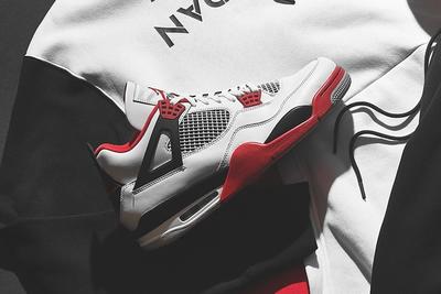 Air Jordan 4 'Fire Red' jd sports hero shot