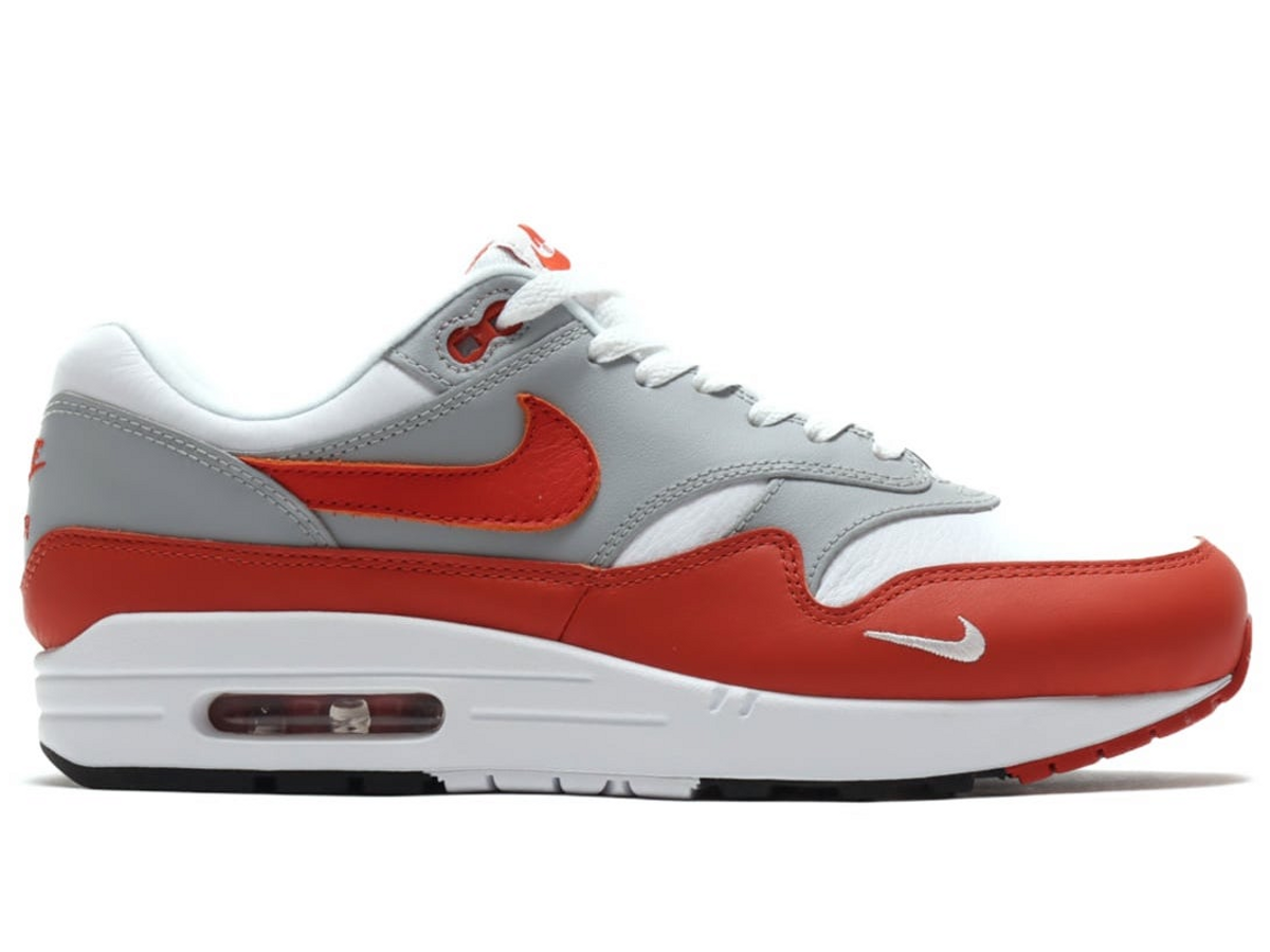 First SNKRS win AM1 Martian Sunrise. Only right shoe has extra check. Is  this a factory error ?? : r/Sneakers