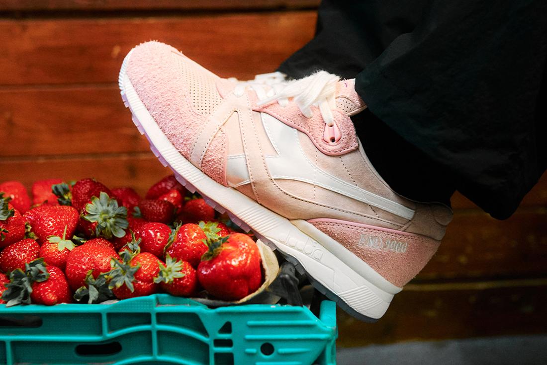 END. x Diadora N9000 pink sneakers next to crate of strawberries