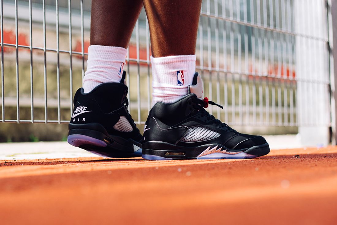 Jordan 5 black orders metallic on feet