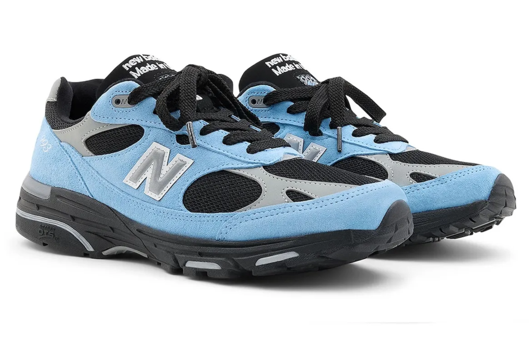 light blue and black new balance sneaker on white background