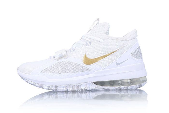 white nike shoes gold swoosh