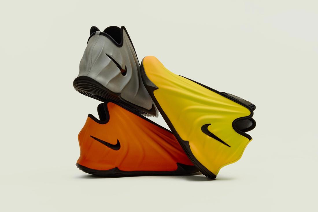 Grey, orange and yellow nike gt future sneakers in a pile