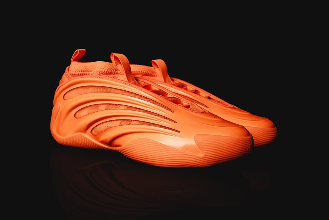 Bright orange harden vol. 9 sneakers on black background