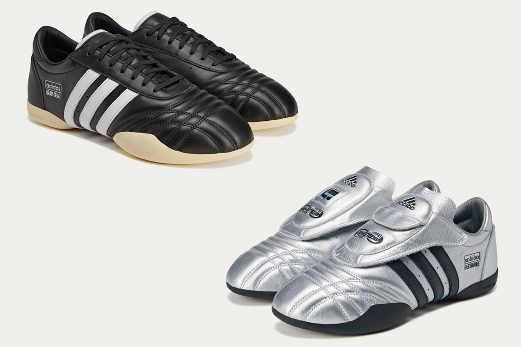 silver and black adidas sneakers on cream background