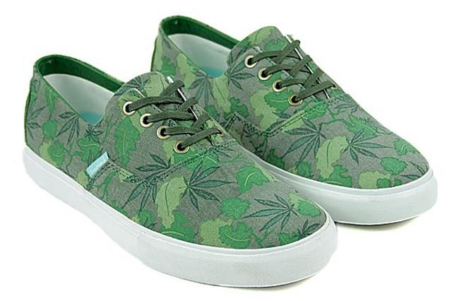 Green and white sneakers weed shoes on white background