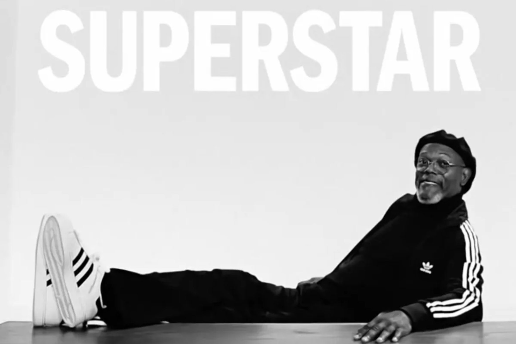 samuel l jackson sitting with his feet up on a table