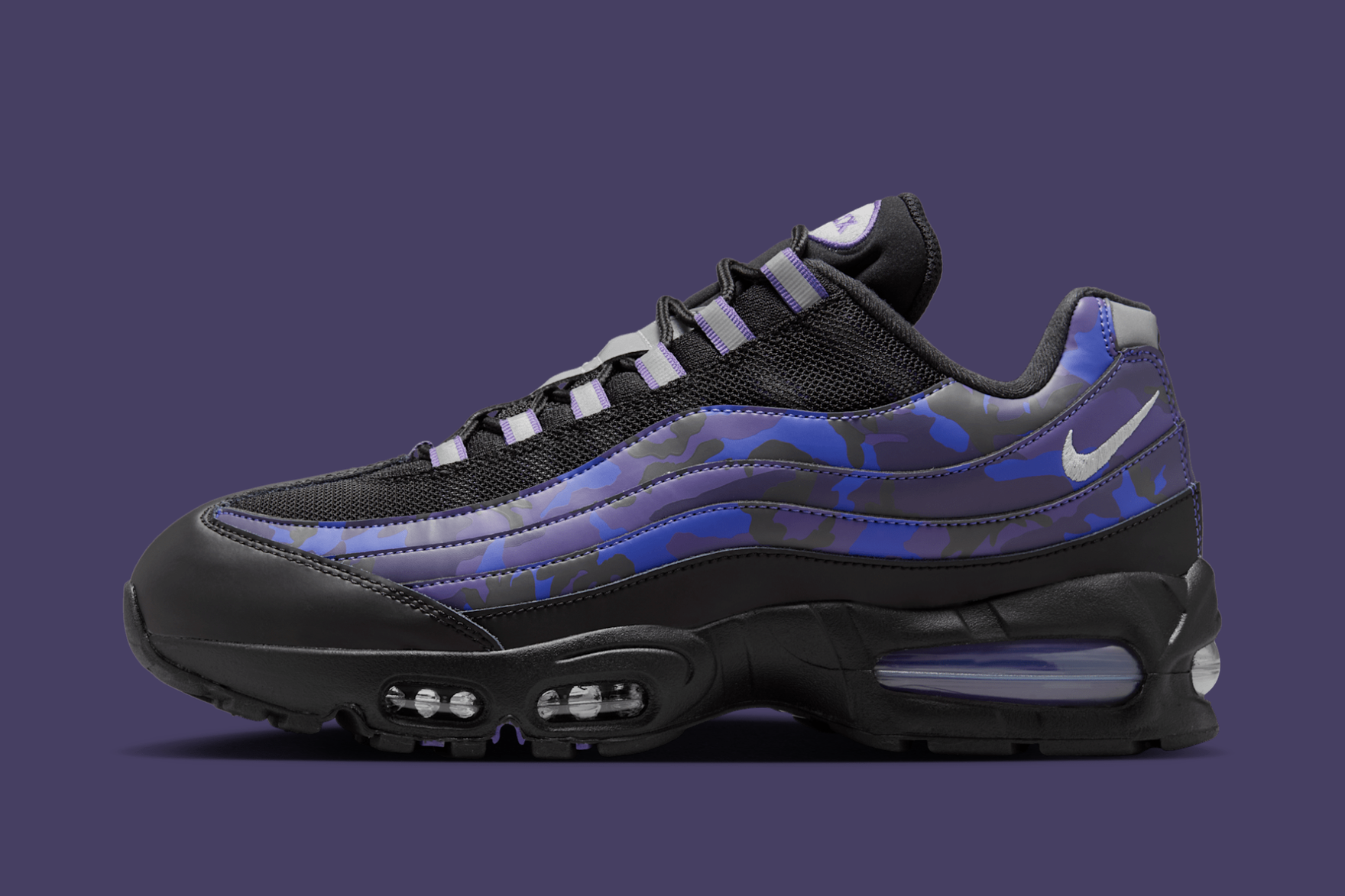 nike air max 95 court purple camo on purple background