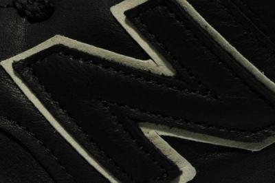 New Balance 576 Premium Leather Black Logo Detail 1