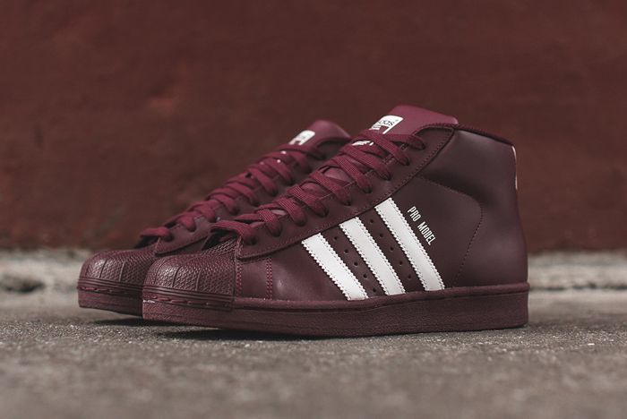 burgundy and white adidas pro model