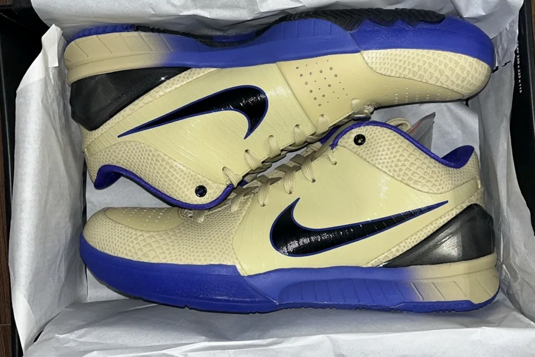 Purple and yellow FC Barcelona x Nike Kobe 4 sneakers in shoebox