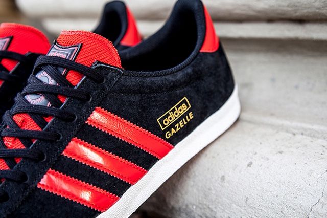 red and black adidas gazelle
