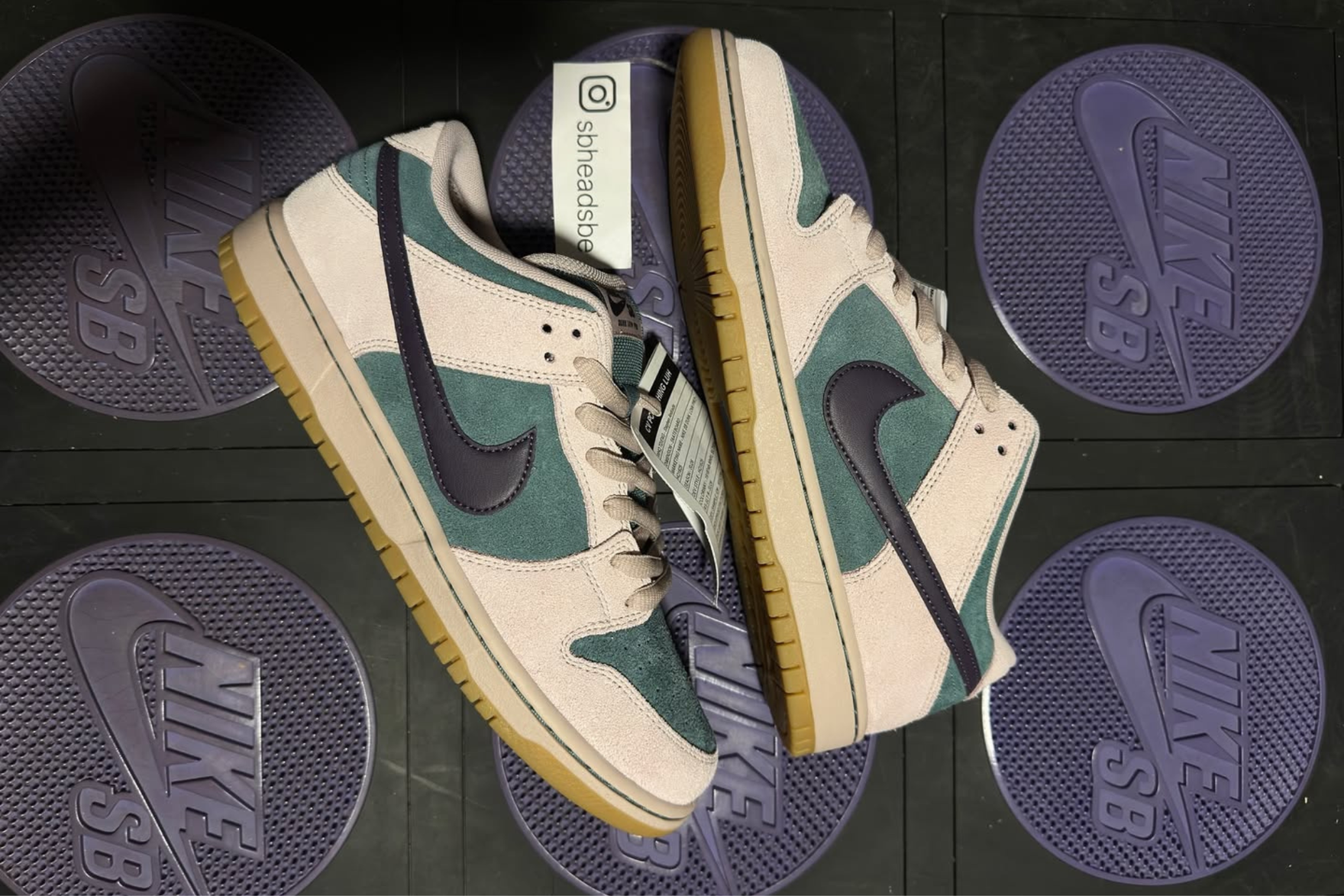 a sample style nike dunk sneaker with green and white side panels