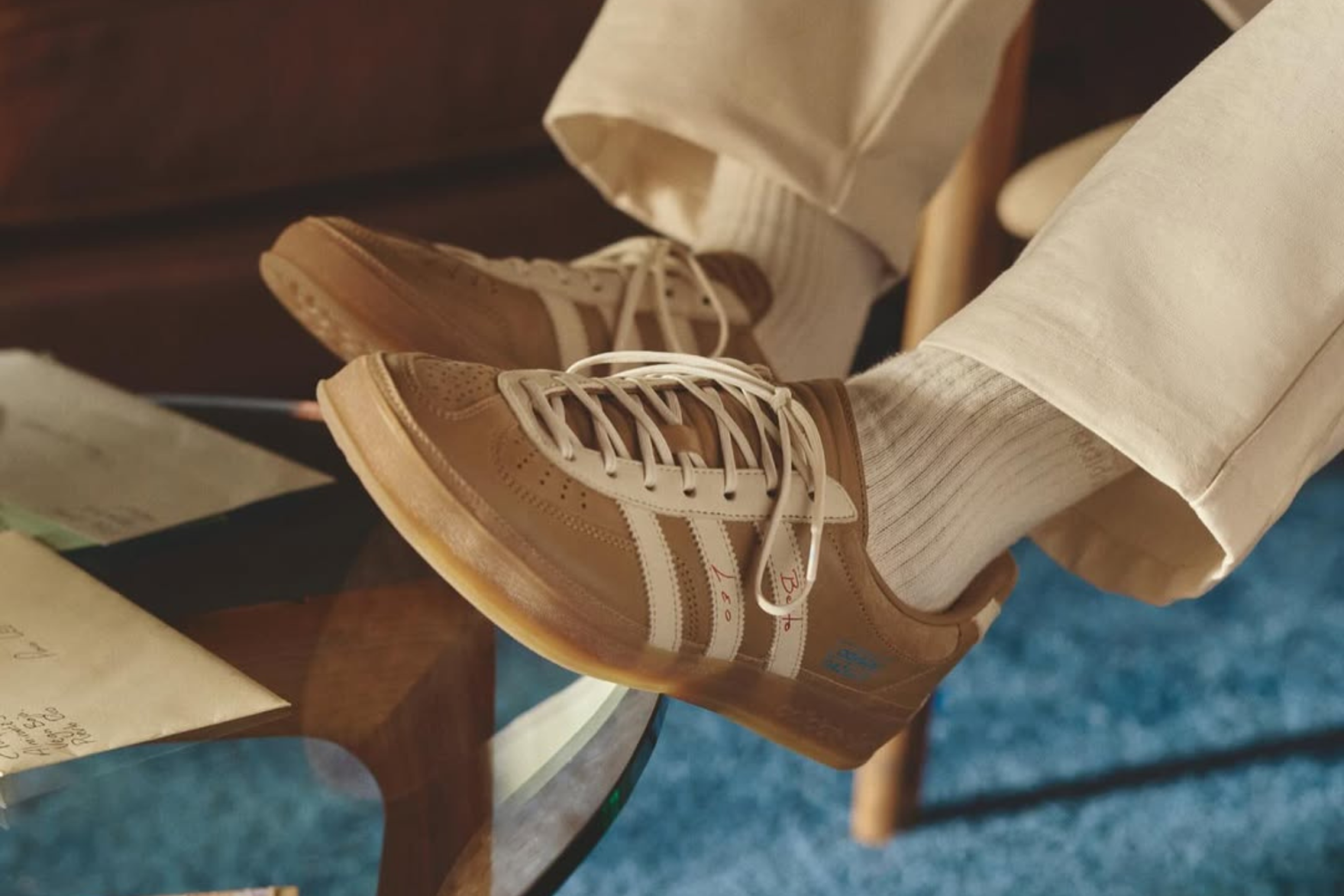 brown adidas gazelle sneakers on-foot with white socks