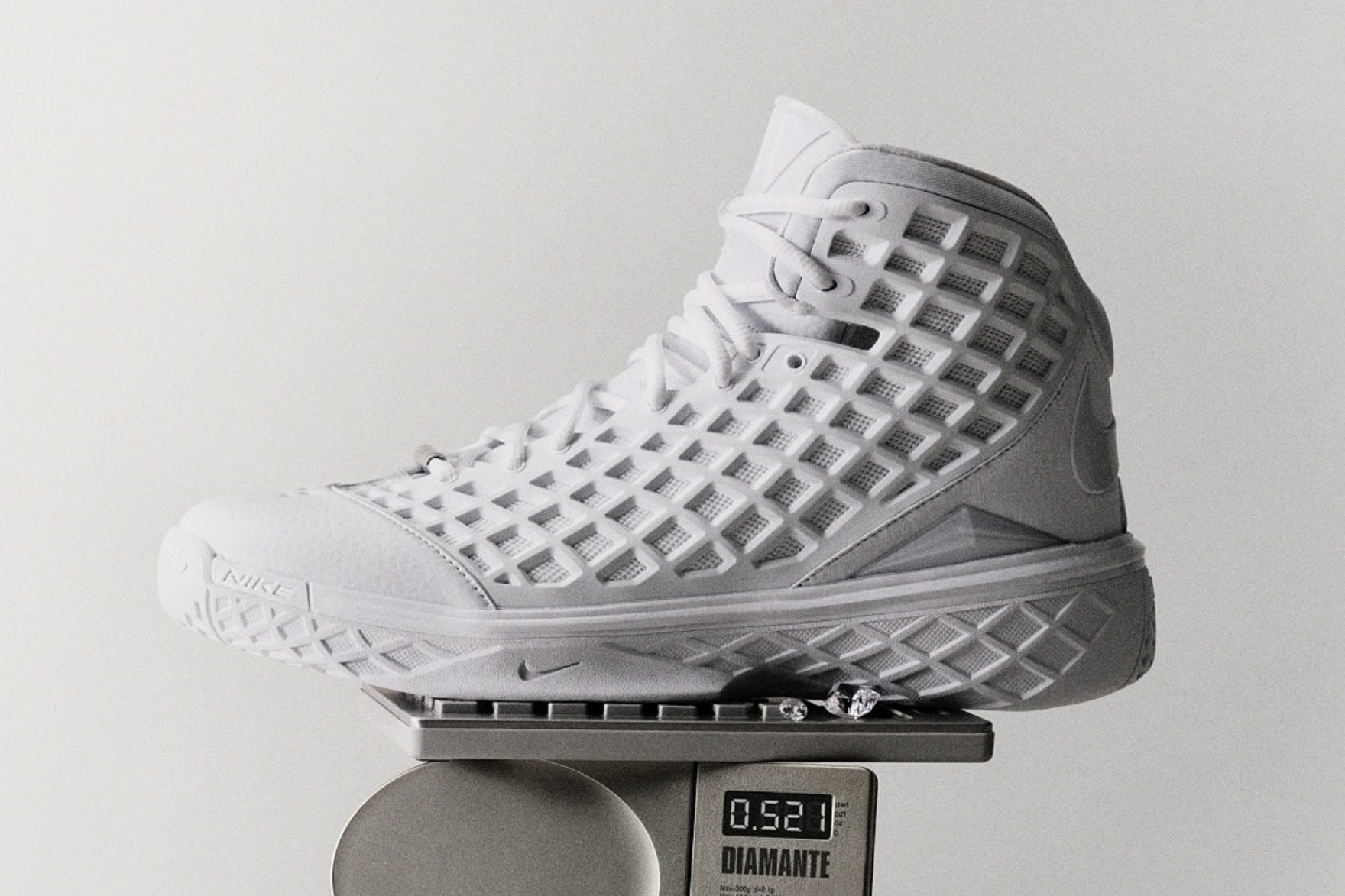 Nike Kobe 3 Protro 'Halo' sneaker on a white speaker