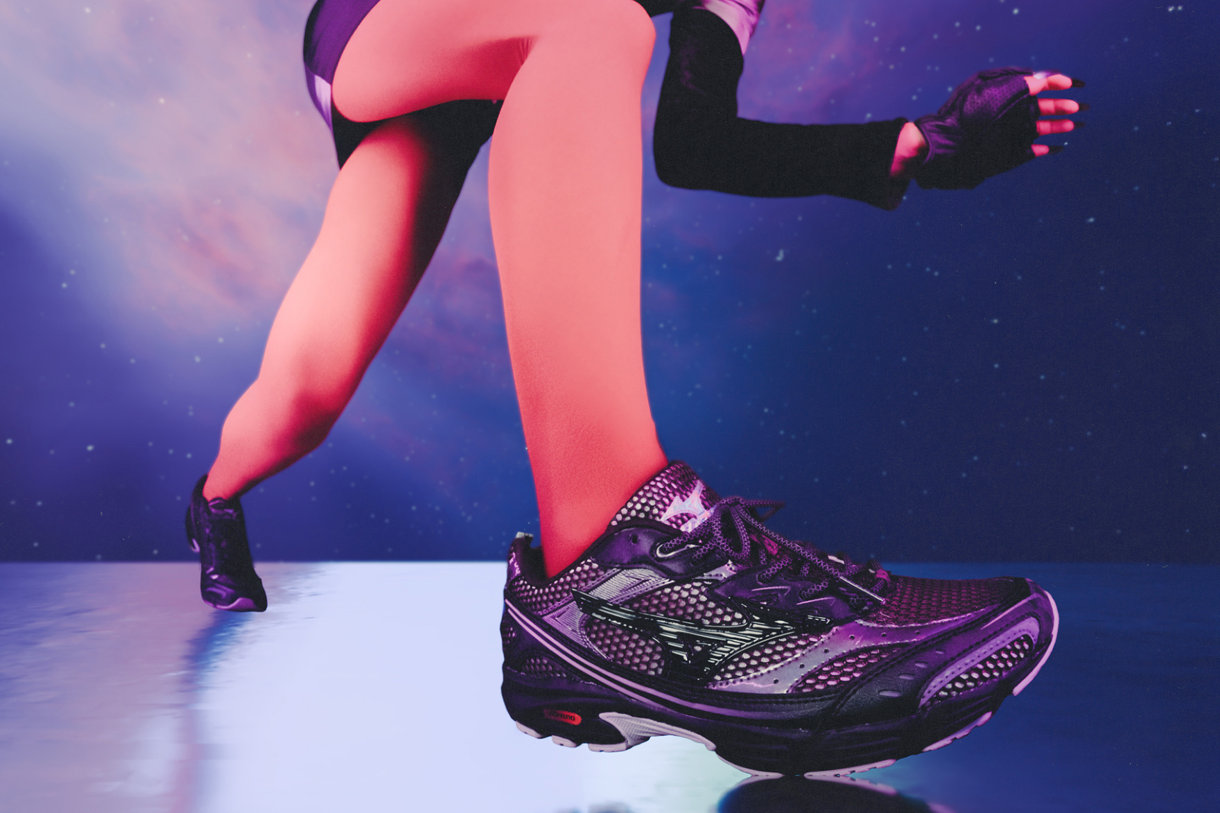 close on on-foot shot of purple sneaker against space background