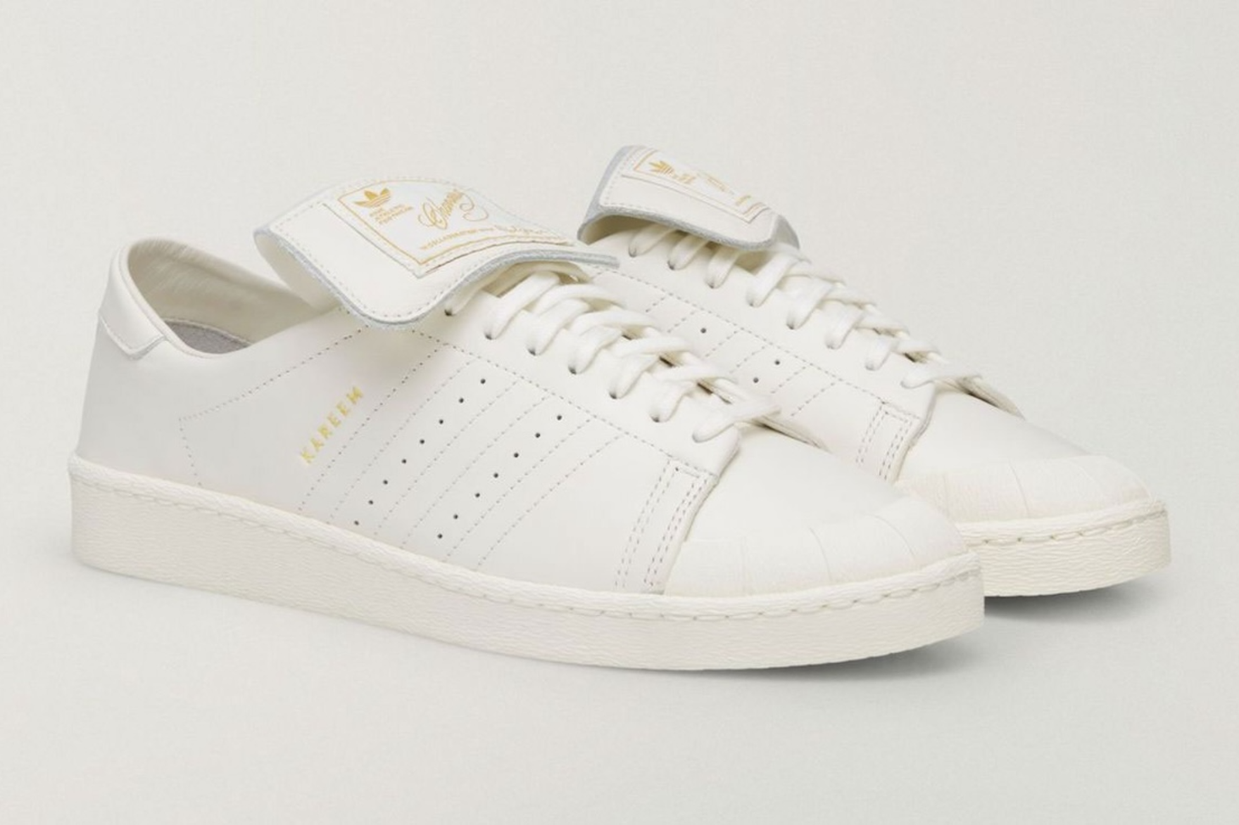 plain white adidas sneaker on white background
