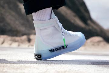 off white converse on foot