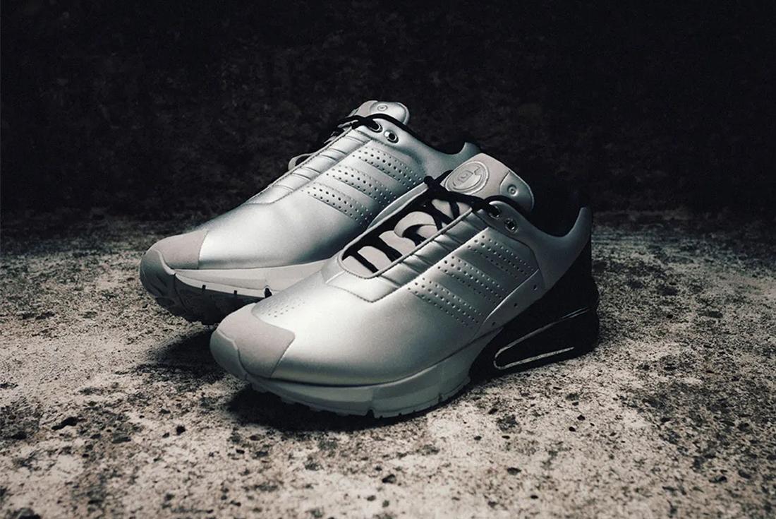 END Y3 adidas silver sneaker sitting on a concrete surface