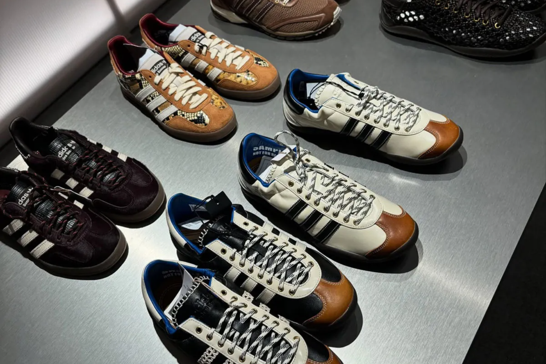 wales bonner sneakers on a silver table