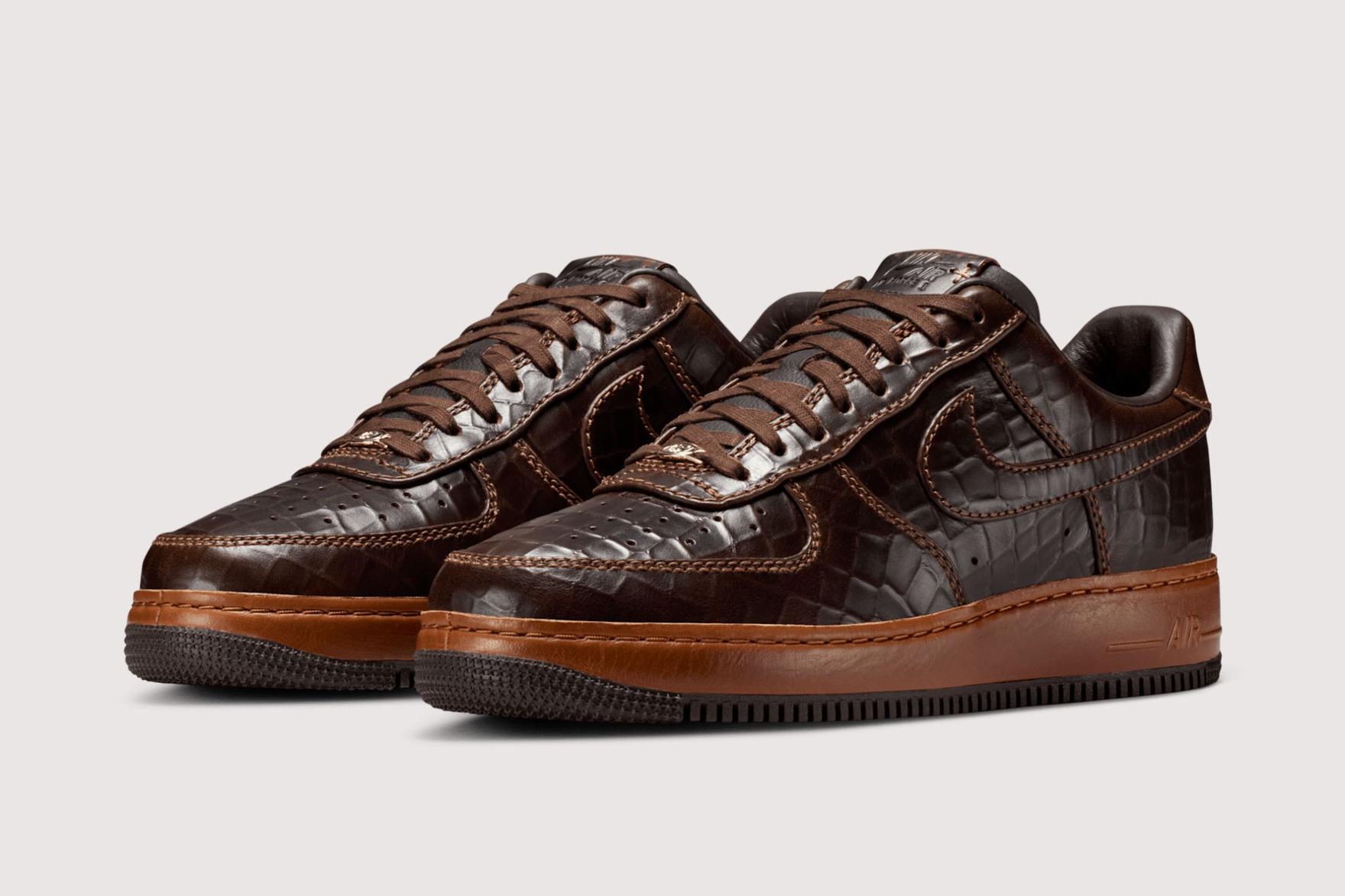 Brown crocodile skin Nike Air Force 1 Low sneakers on grey background