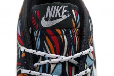Nike Toki Textile Midasgold Pimento Tongue Detail 1