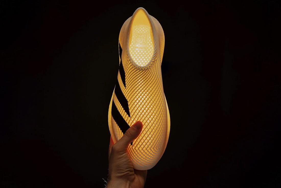 White and black adidas climacool 24 sneaker on black background