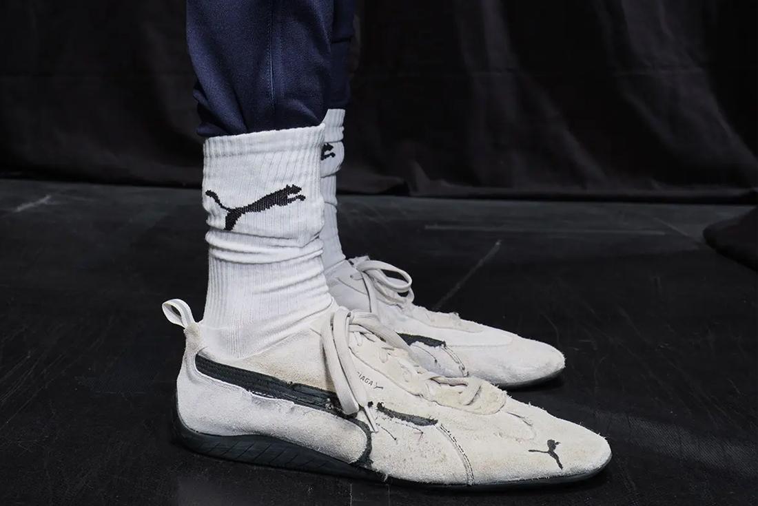 Black and white balenciaga puma speedcat sneakers on-foot